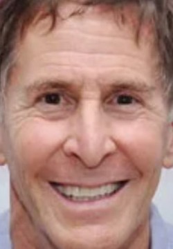 Том Шульман