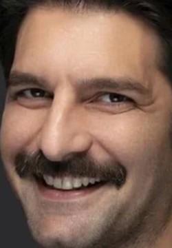 Танер Румели