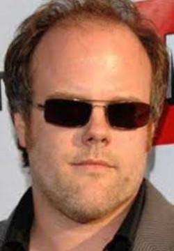 Том Капинос